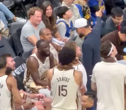 海洋之神·hy590-美媒晒照：暂停期间库里正在指导追梦，他已进入执教模式